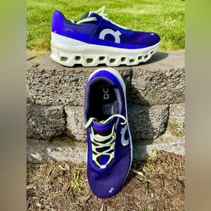 On Cloudmonster running shoes in the Acai/Aloe colorway